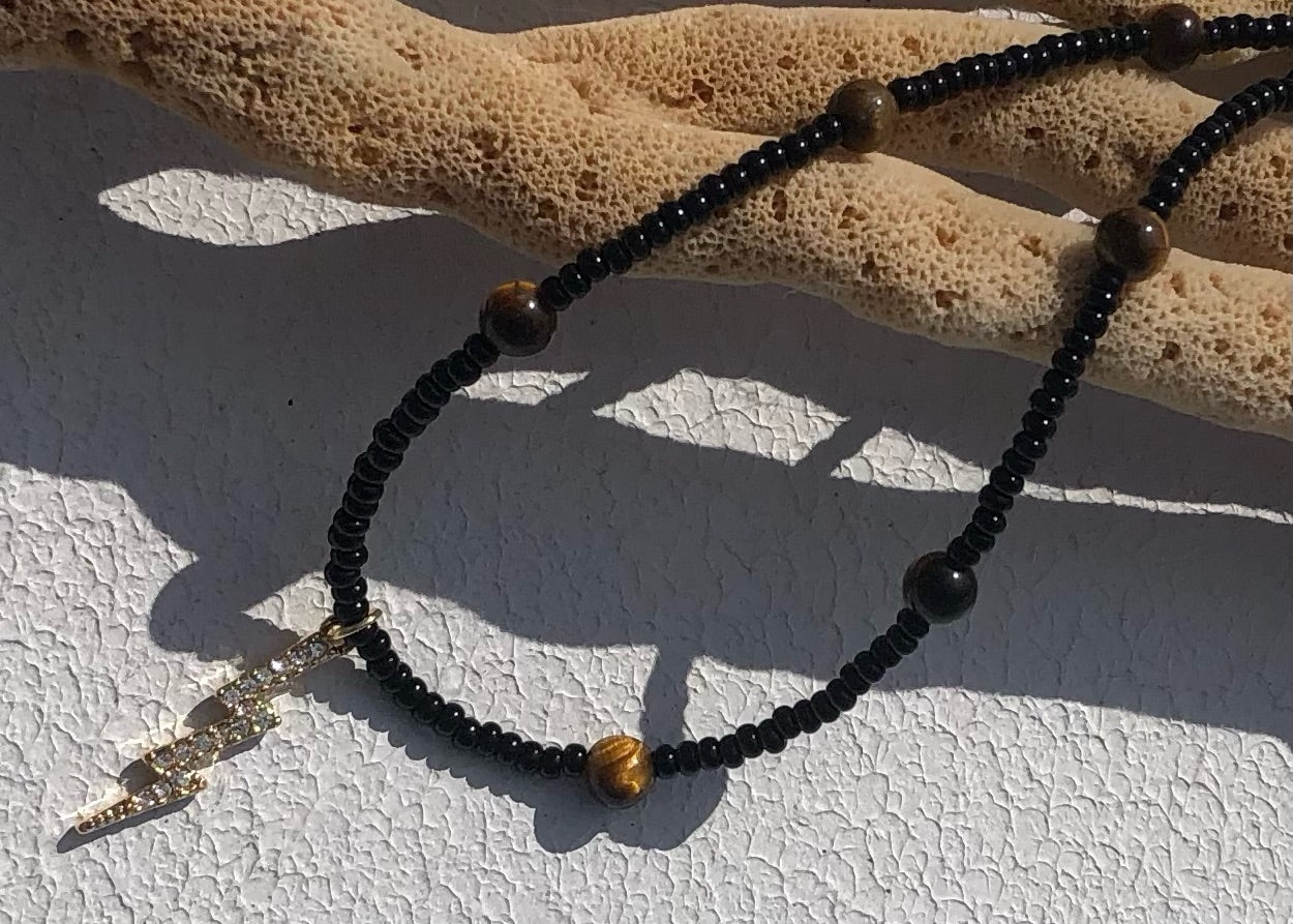 Lightning Bolt w/ Clear Crystals Strung w/ Black Seed Beads & Tiger's Eye