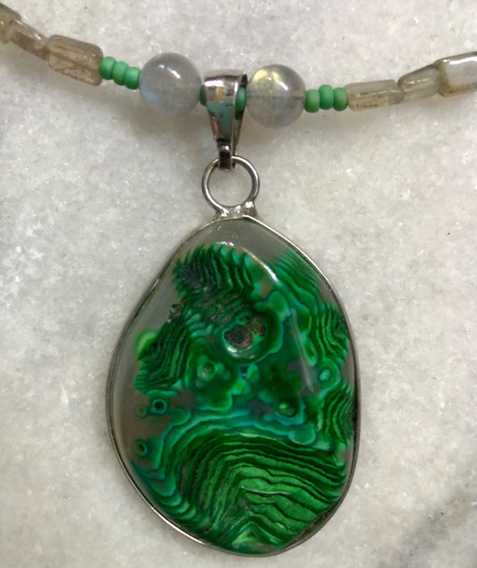 Green moss agate necklace with labradorite beads, green glass seed beads, and silver plated fish clasp.