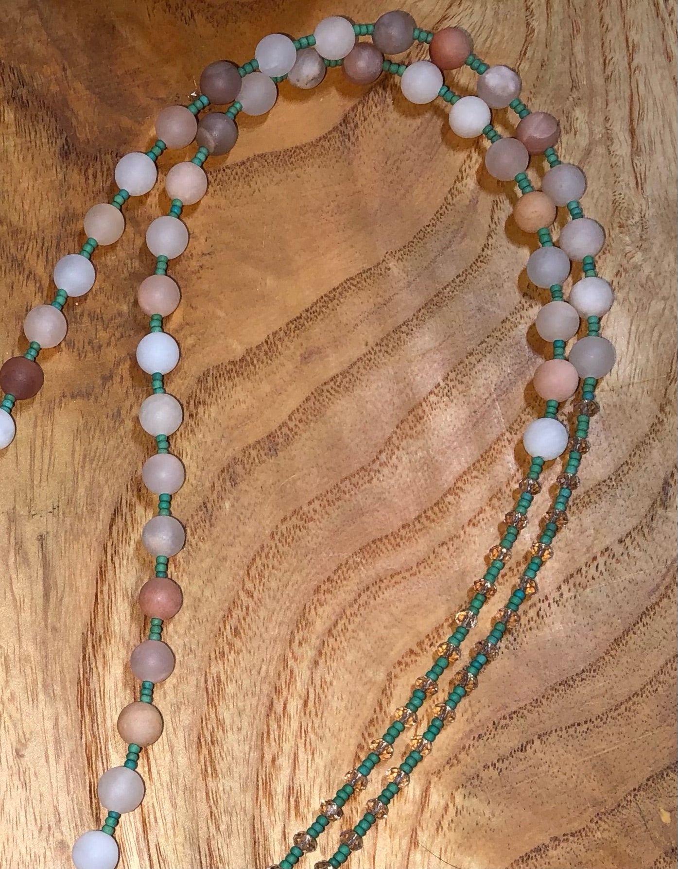 Mala with 54 matte peach aventurine beads, Austrian light peach faceted crystal beads, green glass seed beads, and 3.54" peach tassel.
