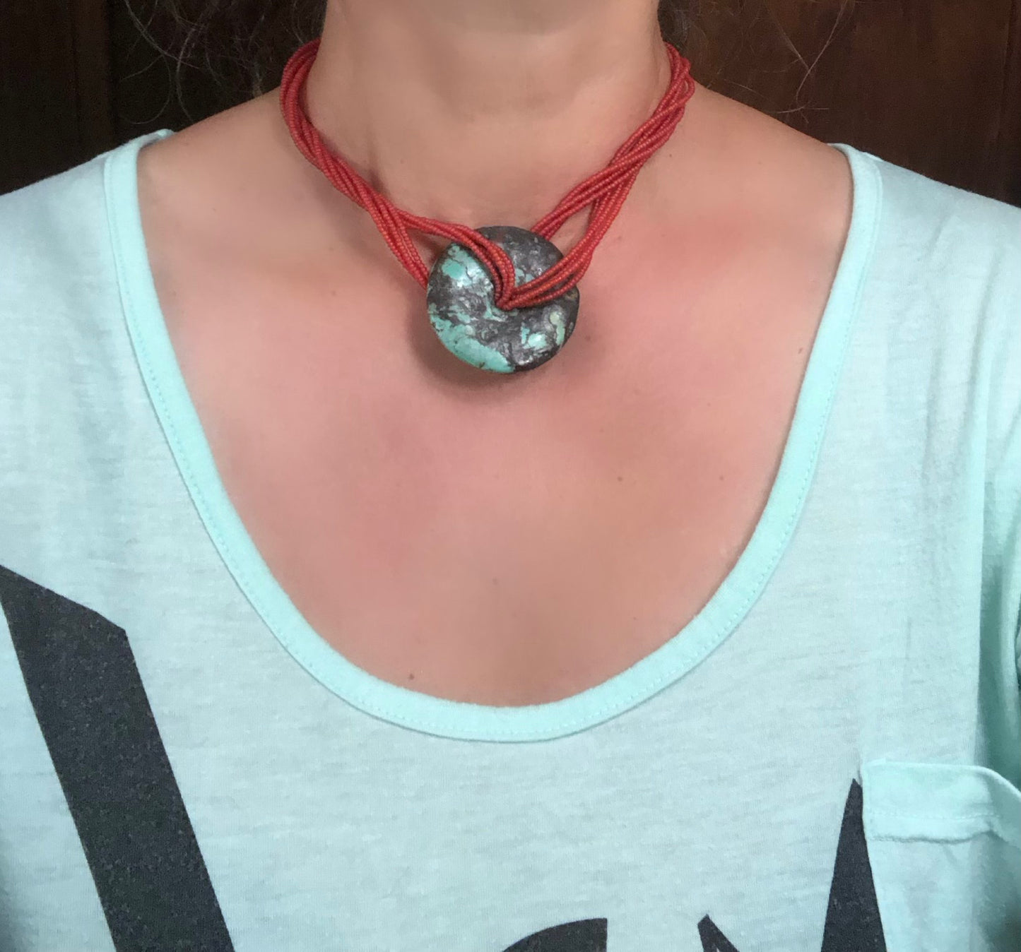 Turquoise Donut Pendant Strung on 8 Strands of Red Glass Seed Beads